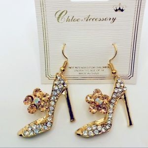 Earrings Stillettos Crystal set in Gold tone. Pierced.VERY SPARKLY AND B…